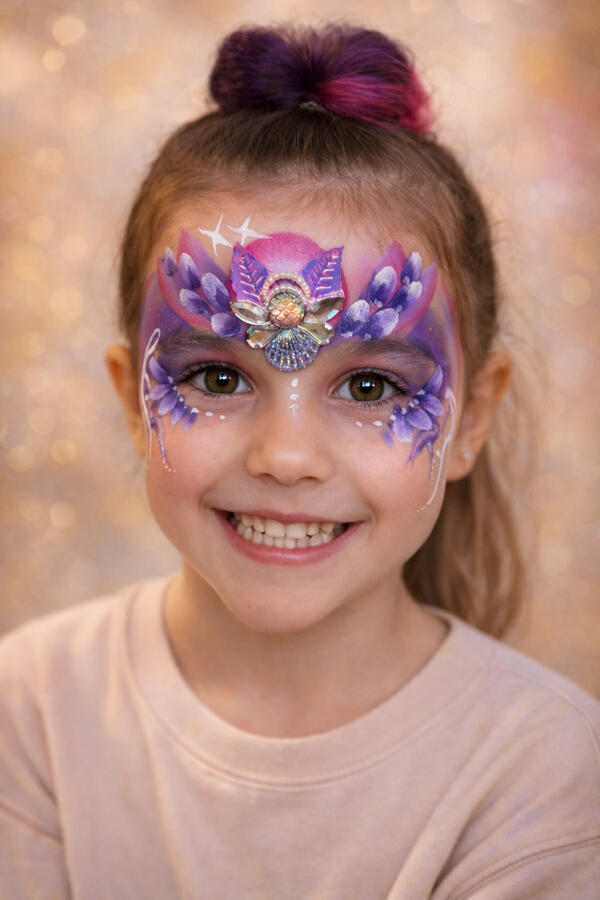 Queen flower crown face painting with bling